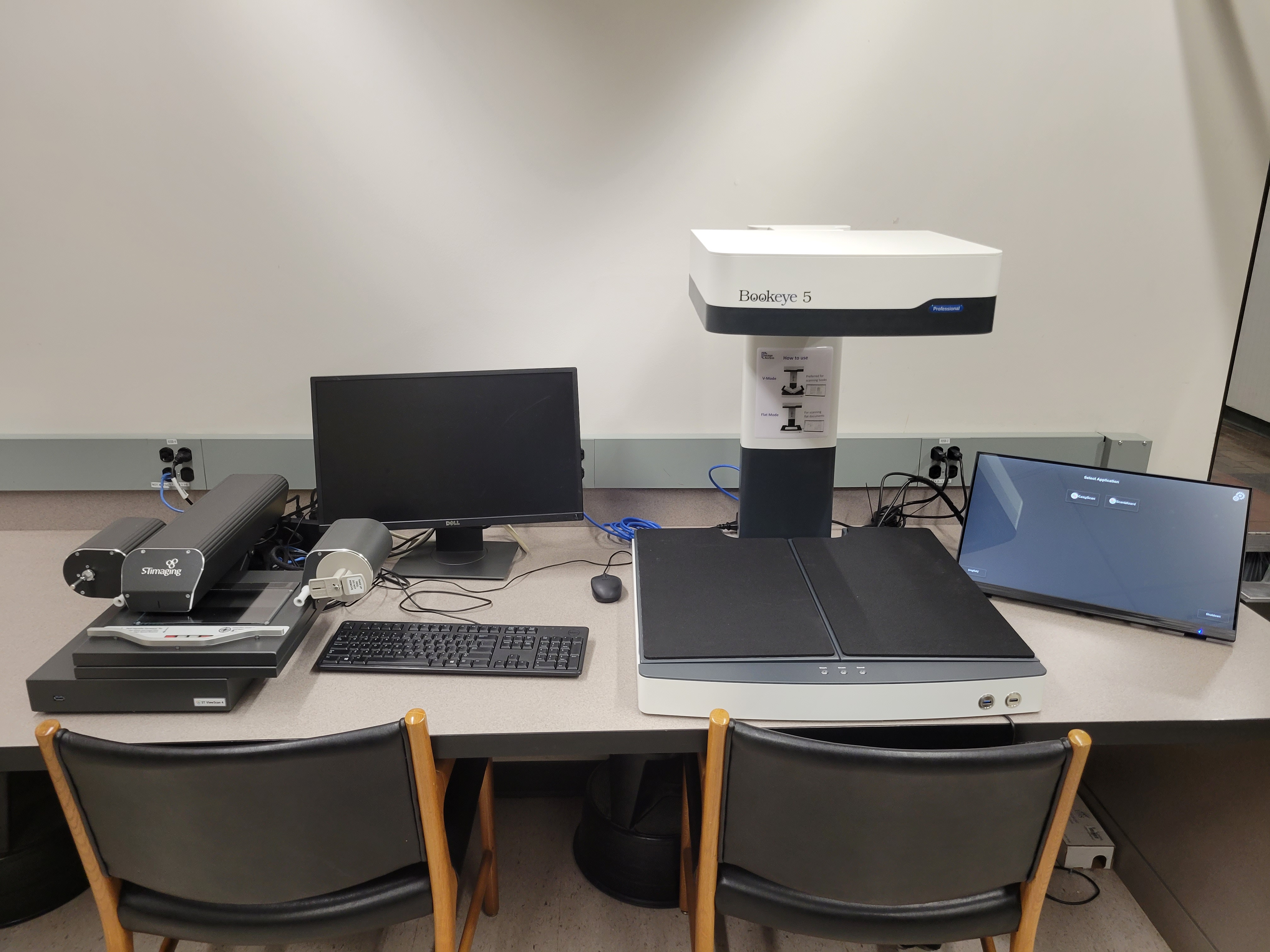 new technology equipment: a book eye scanner and a microfilm reader