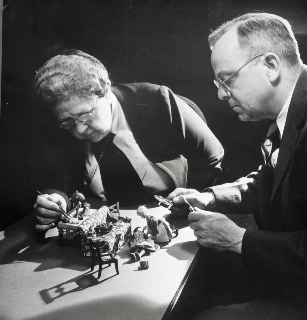 Frances Glessner Lee and Alan R. Moritz working on furnishing for the Nutshell Studies, circa 1948. From the Harvard Medical School Department of Legal Medicine records, RG M-DE06 Series 00517. 