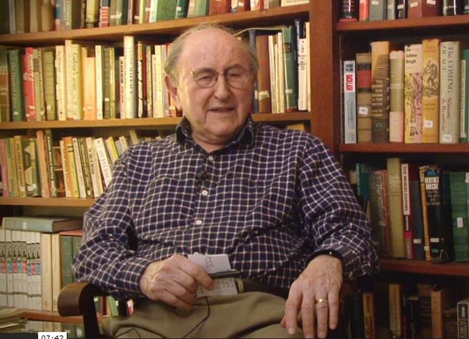 Photograph of Bernard Lown seated in his library, 2014