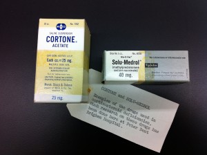 Boxes for the medications Cortone and Solumedrol with a tag that describes how the medications were used.