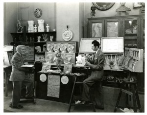 Dickinson and Belskie standing in office surrounded by anatomical models.
