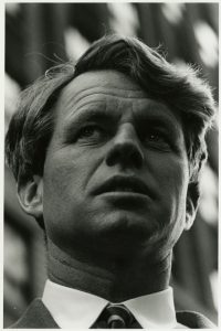 Close up black and white photograph of Robert F. Kennedy.