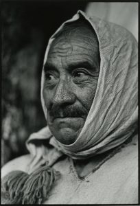 Black and white portait of a Mayan man from Zinacantan with cloth wrapped around his head.