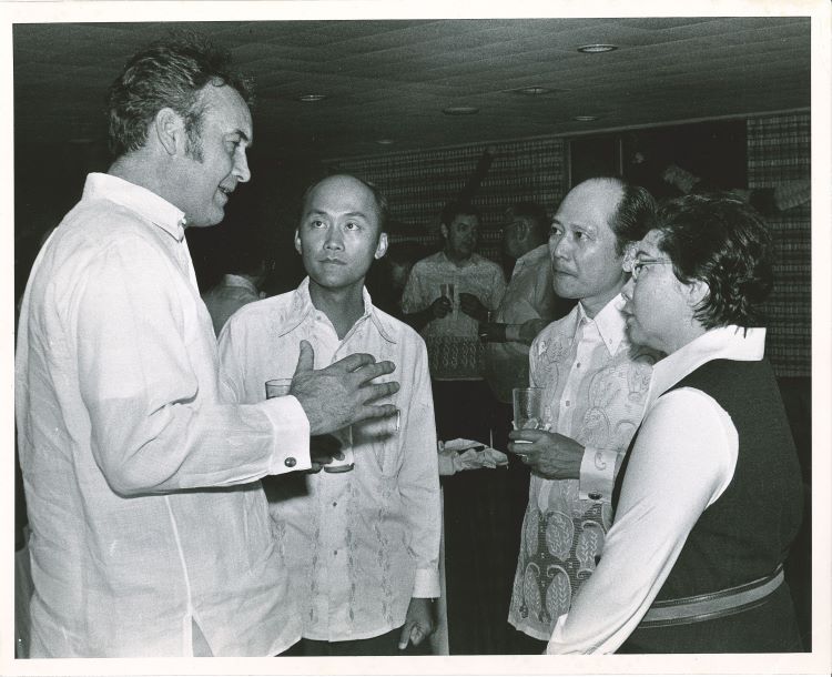 Four people talking