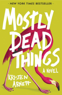 The cover of Mostly Dead Things has a bright pink flamingo walking with its head low to the ground across a yellow background. It's a New York Times bestseller.