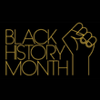 Gold writing over a black background: "Black History Month" next to the outline of a raised fist.