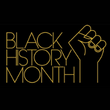 Black History Month written next to the outline of a raised fist.