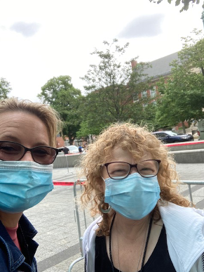 selfie of Elaine and MJ outside with surgical masks on