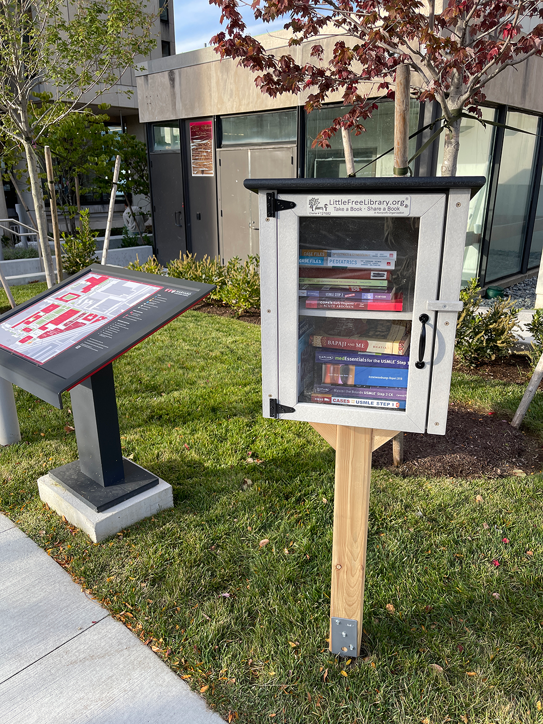 A Little Free Library filled with books outside of Countway Library