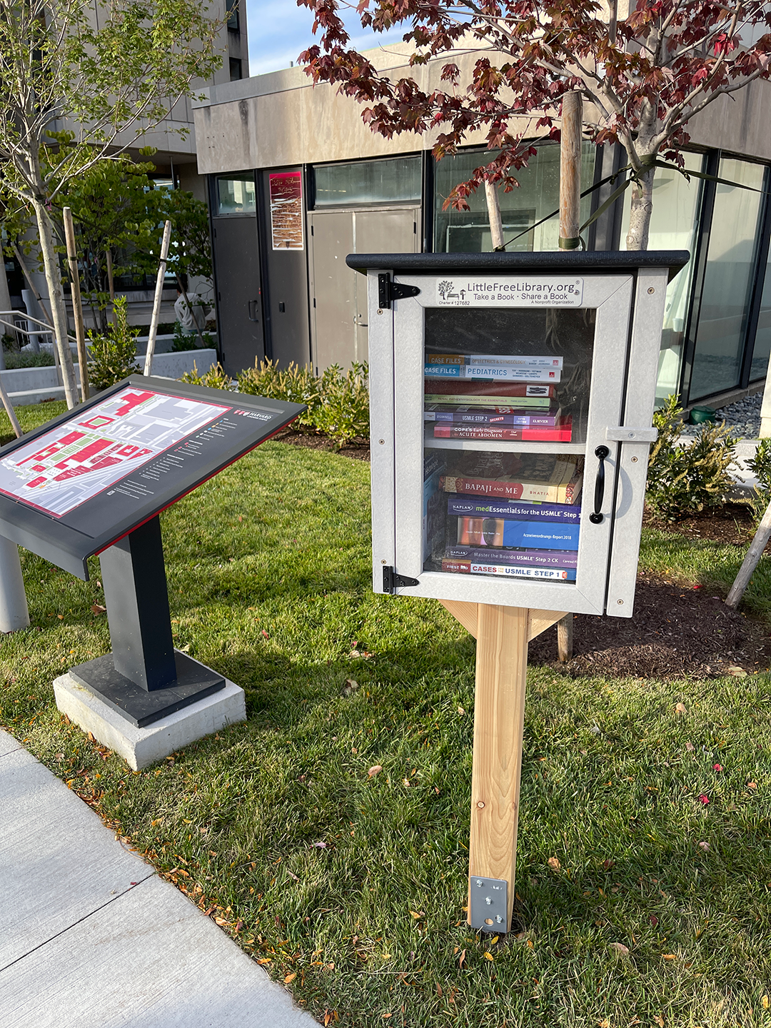 A Little Free Library outside of Countway Library filled with books