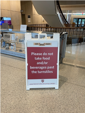 Sign in Countway that says: Please do not take food and/or beverages past the turnstiles.