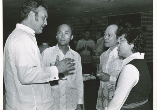 Four people talking