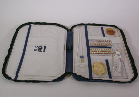 A zippered portfolio from the Pathfinder fund of multiple forms of contraceptives.