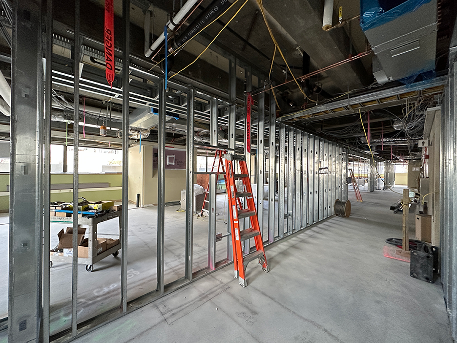 L1 renovation progress showing metal framing for new walls