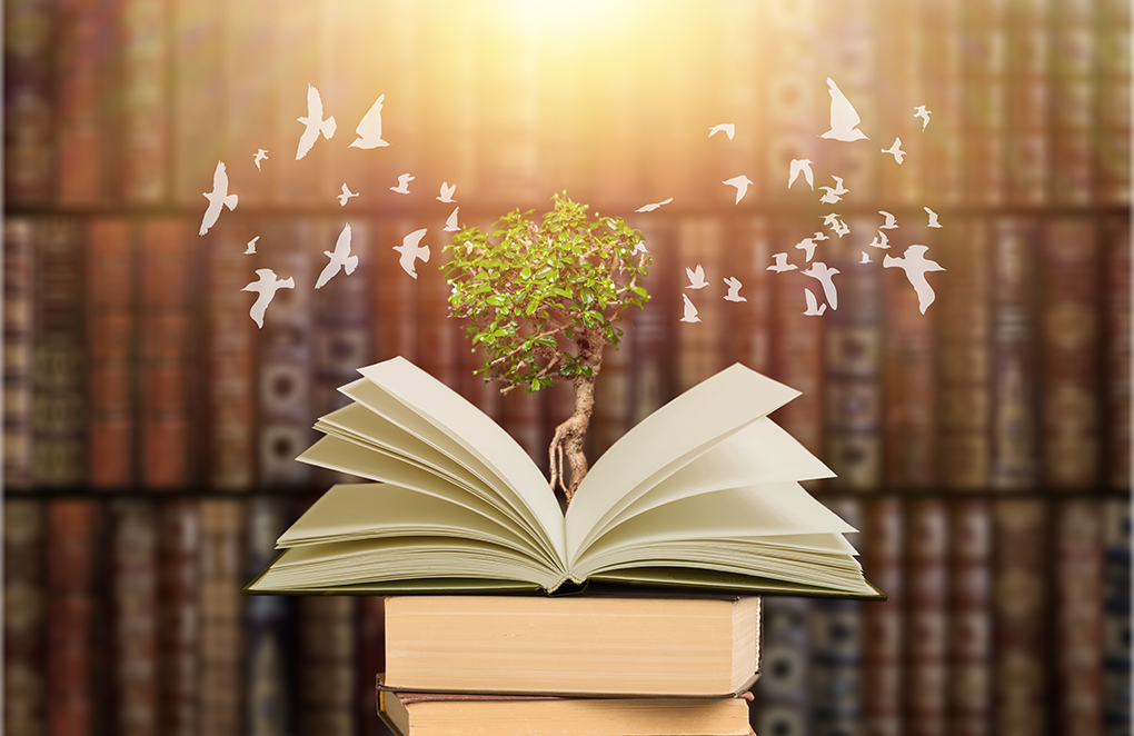 library book with a tree and doves coming out of it as a symbol of knowledge and life for National Medical Librarians Month